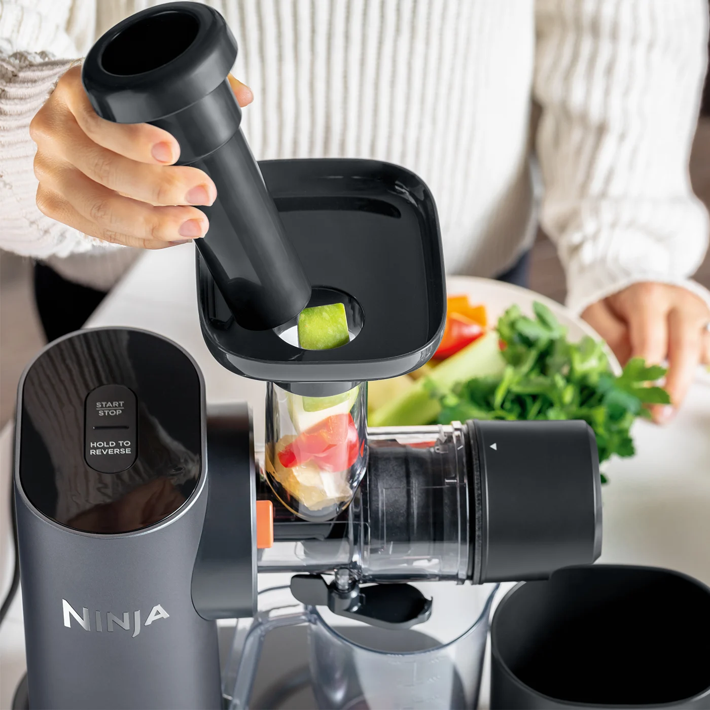 Ninja-JC151UK-InUse-OnIsland-Filling-Funnel-Woman_sdvr5t