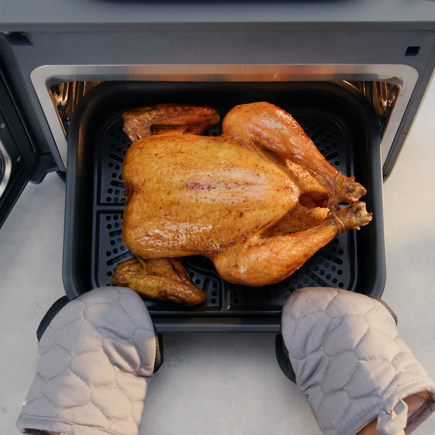 Ninja-SFP700UK-InUse-Above-CombiCrisp-WholeChicken